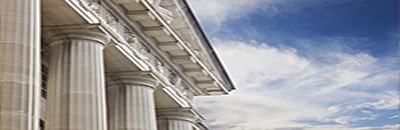 An image of marble columns in the Doric Order